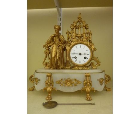 A small 19th century classical mantle clock with alabaster plinth with gilded mounts raised on lions paw supports, the enamel