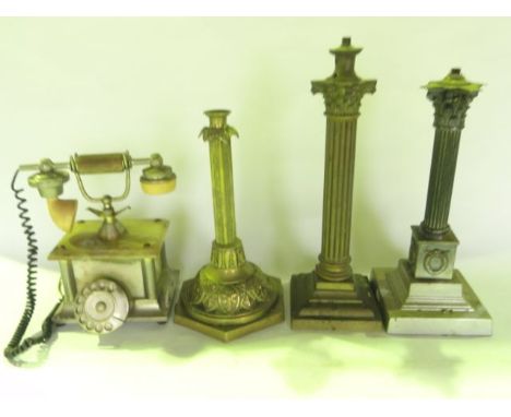 A substantial copper desk lamp in the form of a fluted column with Corinthian capital, a similar shorter silver plated exampl