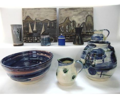 A pair of studio pottery wall plaques with relief moulded and painted decoration of yachts and trees, further Studio Pottery 