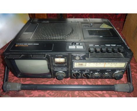 A vintage Hitachi TV/FM/MM/LW radio cassette recorder