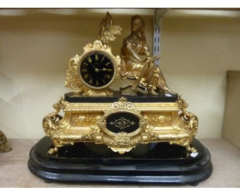 A substantial Victorian gilded mantle clock with marble plinth and dial surmounted by a female representing agriculture, the 