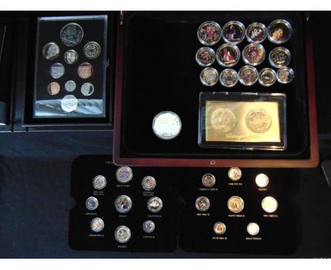 A United Kingdom Proof Coin Set, 2012, fitted display case with certificates; a Tristan da Cunha St George and The Dragon Coi