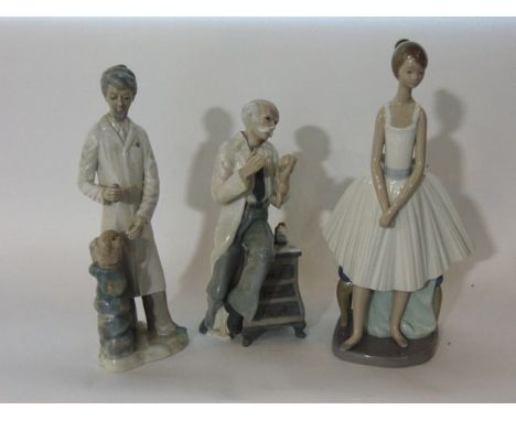 A Nao figure of a young woman in pleated skirt, and two Casades models of a vet and a doctor with a new born baby