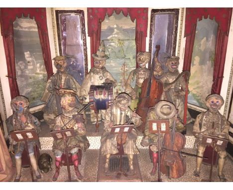 A rare nine piece automaton chamber orchestra, probably Theroude, comprising nine monkeys playing a combination of two harps,