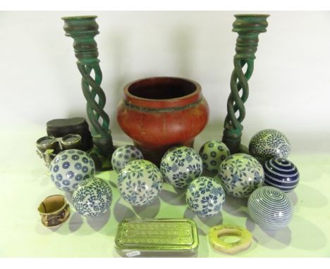 A quantity of decorative ceramic balls in a white ground with printed foliate and other blue decoration, a cased pair of Fren