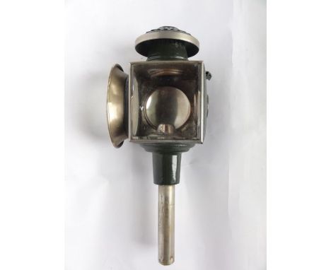 A good quality coach lamp with central squared bevelled glass panel revealing an interior burner bearing plaque - W Stout & C