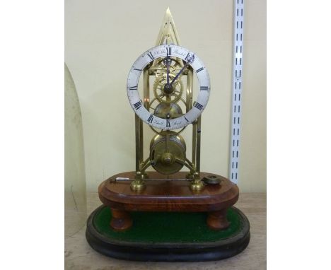 A skeleton clock in brass with silvered chapter ring and with single train fusee movement, J H Allis of Small Street, Bristol