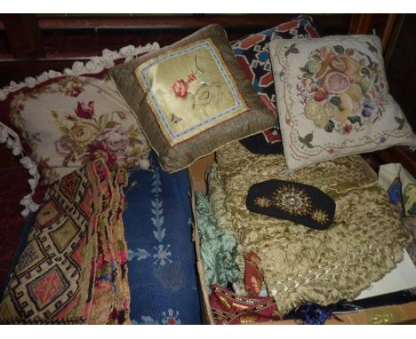 A mixed quantity of textiles to include embroidered cushions of varying type and size, sections of fringe, embroidered panell