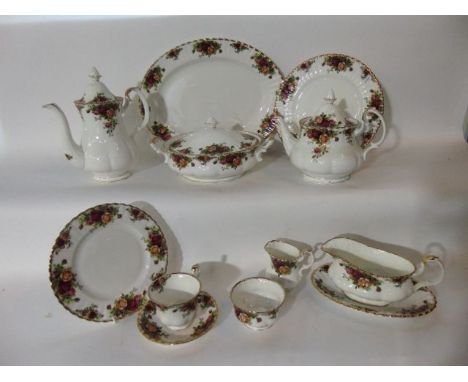 A collection of Royal Albert Old Country Roses pattern dinner and tea wares including a pair of tureens and covers and a furt