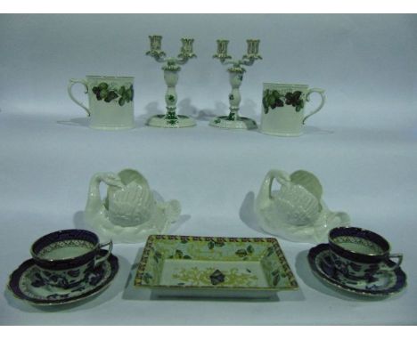 A pair of Herend two sectional two branch candelabra with green and gilt floral detail and printed mark to base together with