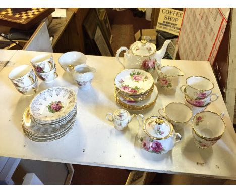 A Royal Albert tea service and a part tea service.