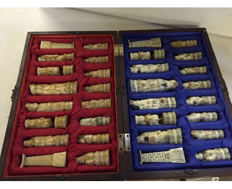 A bone carved boxed chess set with markings to the base reading The Great Ming. The Emperor measuring 125 mm.