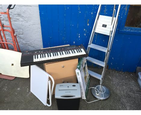 A selection of items to include a set of aluminium step ladders, two folding tables, a keyboard, a shredder and a two draawer