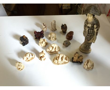 A selection of seventeen resin netsuke and figures.