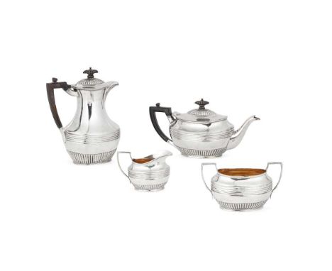 A late Victorian four-piece bachelor's tea service  Hamilton &amp; Inches, Edinburgh 1898, comprising, a teapot, waterpot, tw