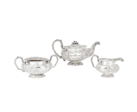 Y A George IV three-piece tea service J E Terry & Co., London 1823, comprising a teapot, twin-handled sugar basin and a milk 