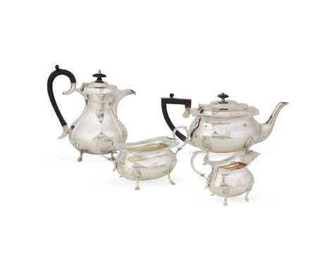 A George V three-piece tea service  William Hutton &amp; Sons Ltd, Sheffield 1918, comprising teapot, twin handled sugar basi