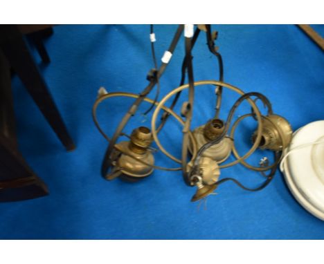 Three vintage suspended ceiling oil lamps
