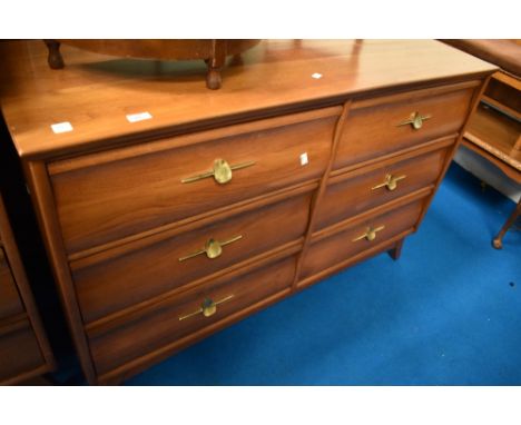 A vintage chest of four by four stylised drawers, with dressing table mirror and support arms, stamped Knechtel, width approx