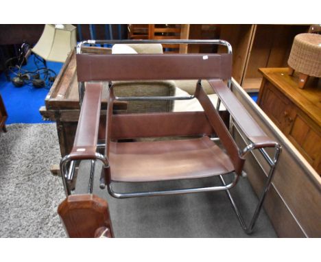A vintage chrome and leather Wassily chair after Marcel Breuer
some age related scuffs to leather, slight damage where stitch