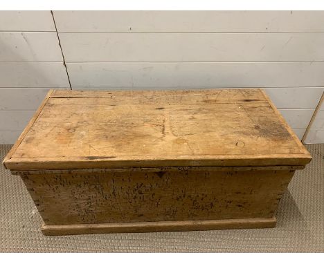 A pine trunk with metal handles to side (H40cm W92cm D47cm)