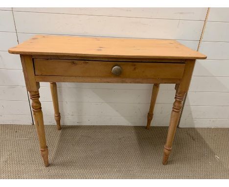 A pine console table with drawers to centre (H73cm W90cm D42cm)