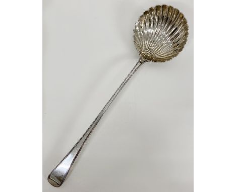 A George Smith (III) shell ladle, hallmarked for London 1777 (35 cm Long)