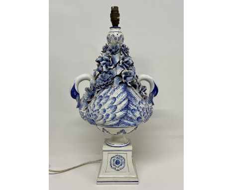 A Blue and White Italian lamp base in the figure of two swans with flowers. (H58cm)Condition Report There has been repairs ma