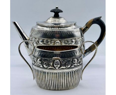 A silver teapot and sugar bowl, hallmarked London 1881, by William Hutton &amp; Sons (Total weight 400g)