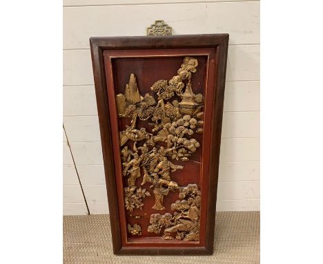 A carved wall hanging Japanese plaque (93cm x 45cm)