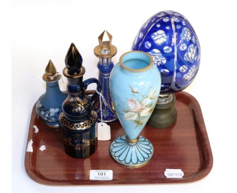 Victorian glass comprising; a gilt decorated blue overlay glass scent bottle, a gilt decorated blue glass oil bottle, a Frenc