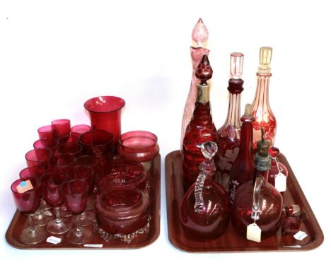 Two trays of 19th century ruby and cranberry glass including decanters, wines, vases etcSome items with small chips. Slight r