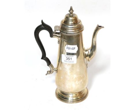 An Edward VII silver coffee-pot, by Mappin and Webb, Sheffield, 1908, tapering cylindrical and with wood handle, the hinged c