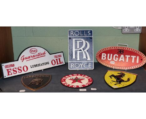 Six signs: Rolls Royce; Esso; Bugatti; Ferrari; Texaco; Lamborghini