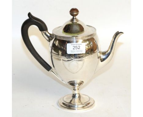 A George V silver coffee-pot, by Roberts and Belk, Sheffield, 1912, tapering and on spreading foot, with ebonised handle, the