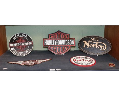 Five signs: two Norton and three Harley Davidson