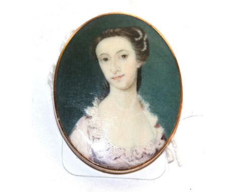 Manner of Gervase Spencer (mid 18th century), portrait of a lady wearing a lace trimmed pink dress, oval, 3.9cm