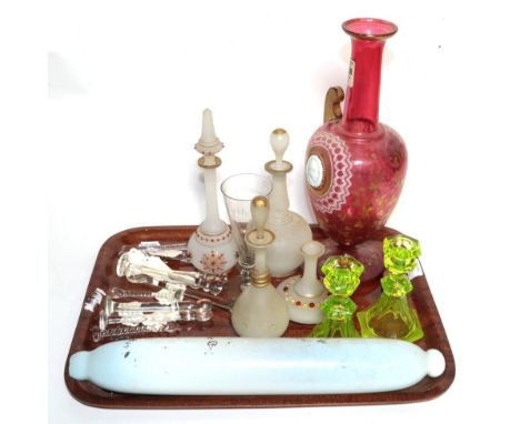 A tray of 19th century glass including sugar crushers, rolling pin, twin handled cameo mounted cranberry glass vase (a.f), a 