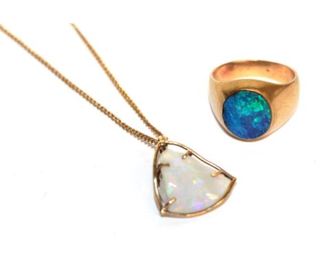 An opal triplet signet ring, stamped '9CT, finger size U; and an opal pendant on a gold plated chain, chain length 45cm .  Ri