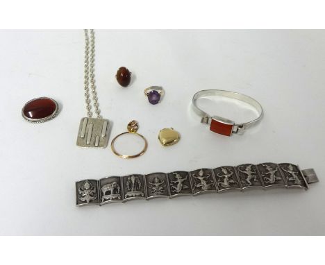 A silver panel link Bracelet, depicting Asian scenes, stamped SIAM, STERLING, two dress Rings, three Pendants, a Brooch and a
