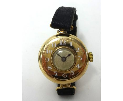 Rolex. A 9ct gold ladies half hunter Wristwatch, London 1920, case number 1162908, 15 jewel movement, white enamel Arabic num