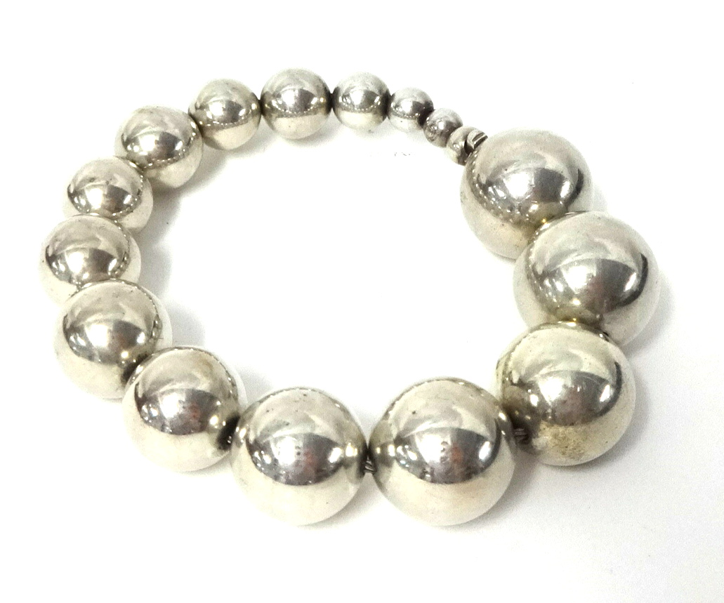 Georg Jensen. A silver graduated ball Cave Bracelet, stamped 925S ...