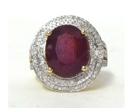 A 14k yellow gold diamond ring set with an oval cut ruby approx 10ct, diamonds approx 1.10total weight, size M1/2