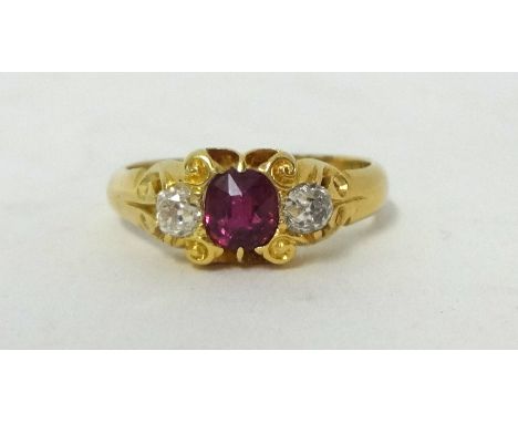 An 18ct antique ruby and diamond ring, size M
