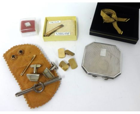 A pair of 9ct gold Cufflinks, with one plain and one engine turned panel, a silver Compact, a pair of 9ct gold and garnet Ear