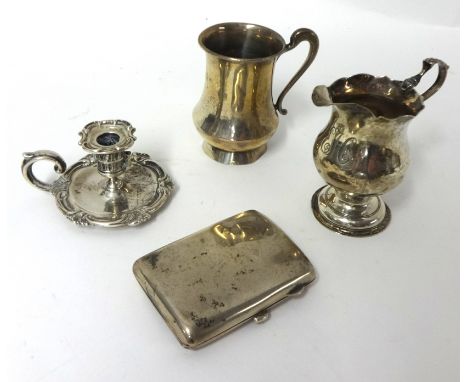 A Victorian silver small chamberstick, by J. &amp; J. Angel, London 1841, a George III silver cream jug, London 1767, of helm
