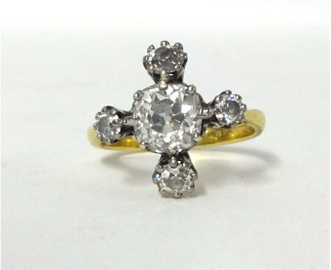 A diamond cluster Ring, claw set with an old cut stone weighing approximately 1.6cts, colour approximately J/K, clarity appro