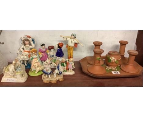 SHELF OF CHINA FIGURINES, POTTERY CANDLESTICKS ETC