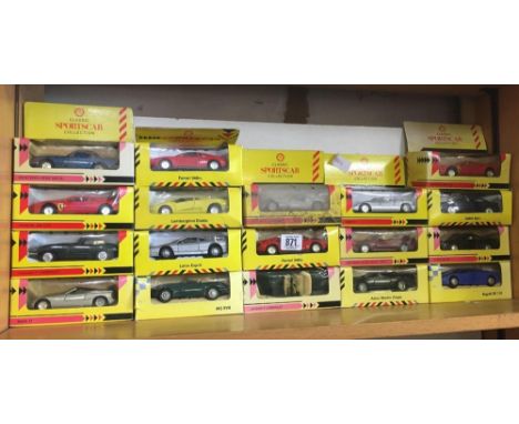 SHELF WITH 18 BOXED CARS FROM THE SHELL SPORTS CAR COLLECTION