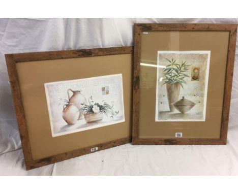 PAIR OF COLOUR PRINTS; ONE WITH GILT HIGHLIGHTS, CERAMIC POTS WITH FLOWERS